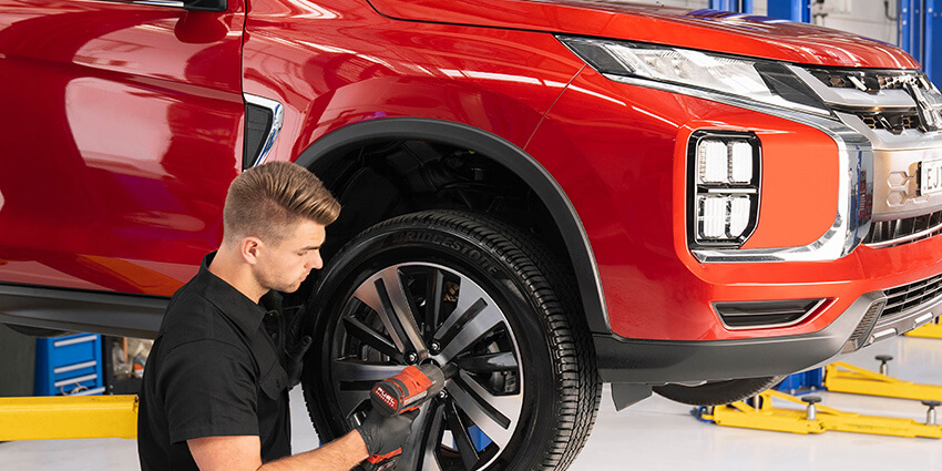 Mitsubishi Mechanic Servicing a Vehicle at Callide Valley Mitsubishi